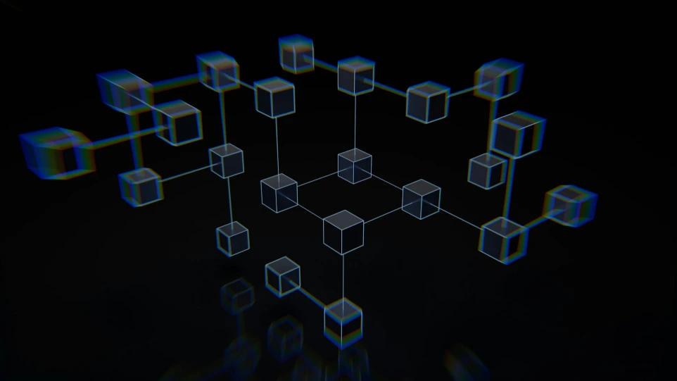 a group of cubes that are on a black surface